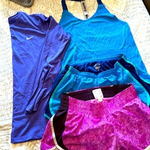 Nike Athletic shorts, tank (size small ) and long sleeve shirt size medium